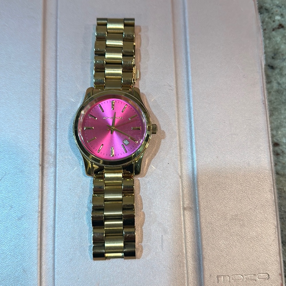 Needs battery.  Michael Kors Watch